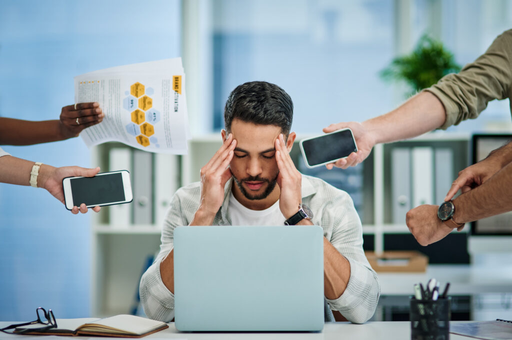 Quiet work needed. A male professional is overwhelmed by interruptions.